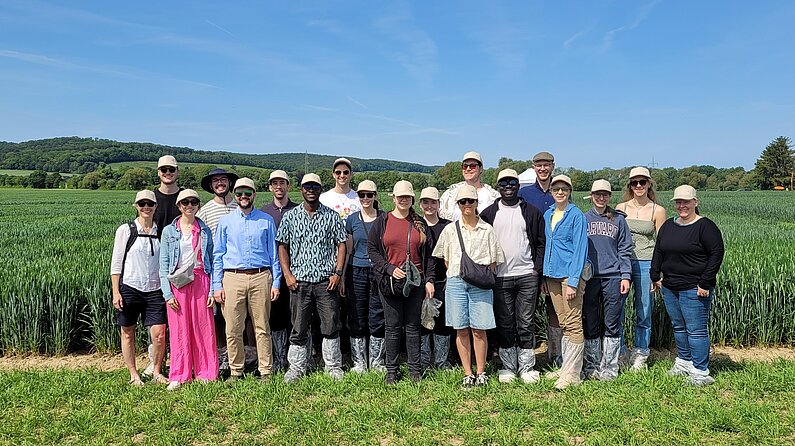 Group picture in front of field